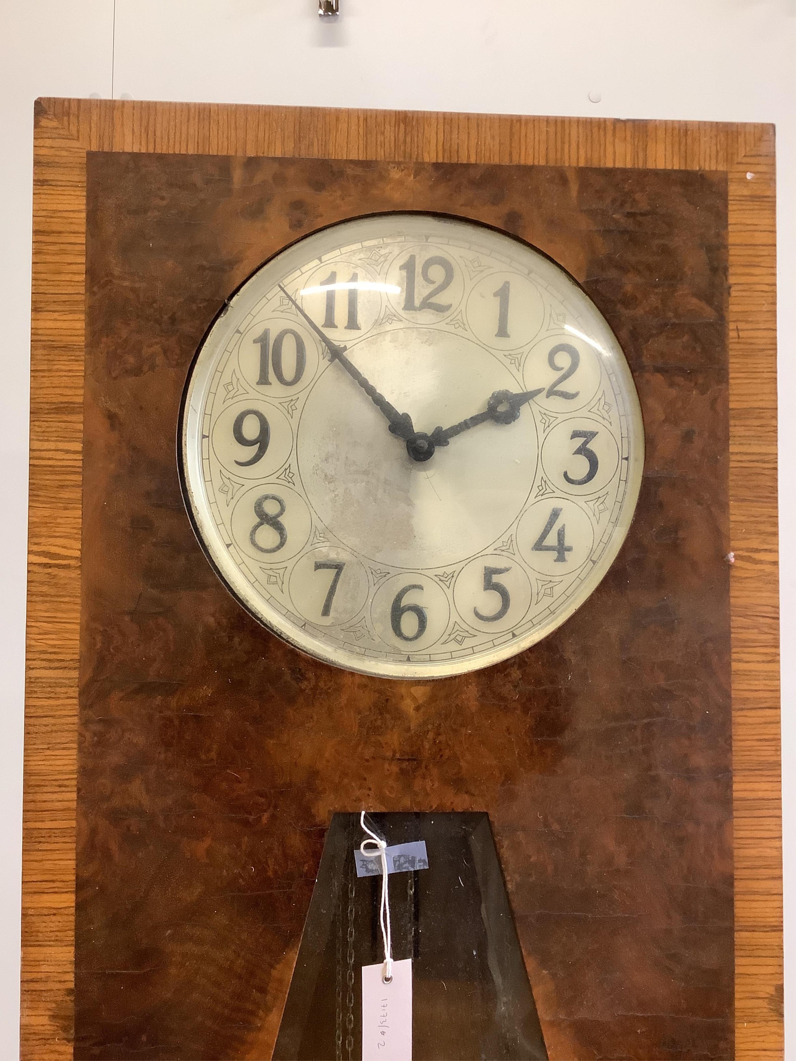 An Art Deco walnut longcase clock, height 196cm. Condition - fair